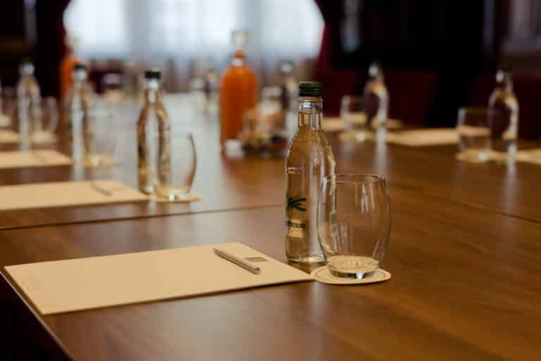 Drinking water and notepad in conference room at the leopold hotel in sheffield